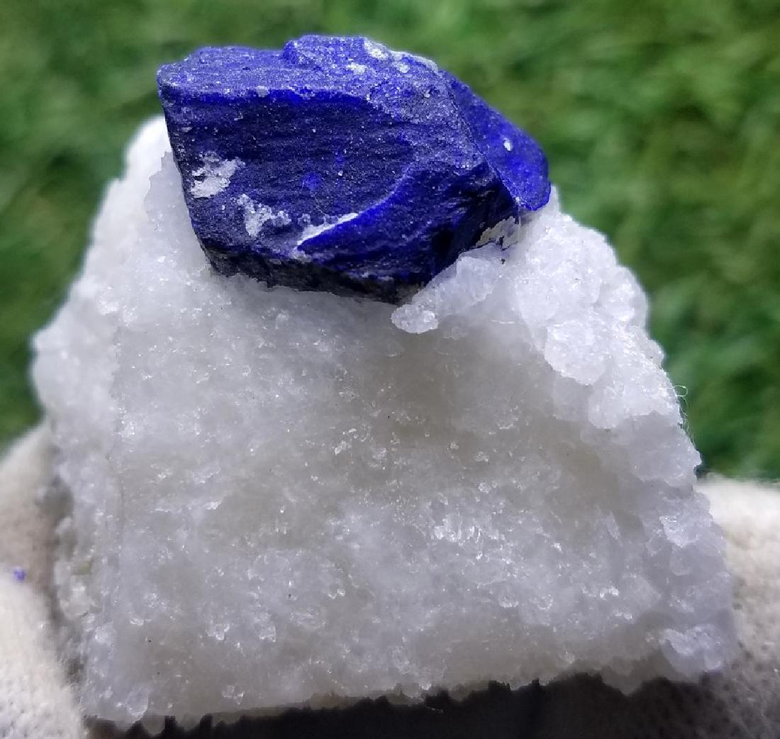 37 Grams Deep Blu Natural Lazurite Specimen: Title: 37 Grams Deep Blu Natural Lazurite Specimen Gemstones: Lazurite Carat Weights: 37 Grams Size/Dimensions 37x36x19 MM Additional Info: Natural Reserve: $30.00 Shipping: Domestic: Flat-rate of $25