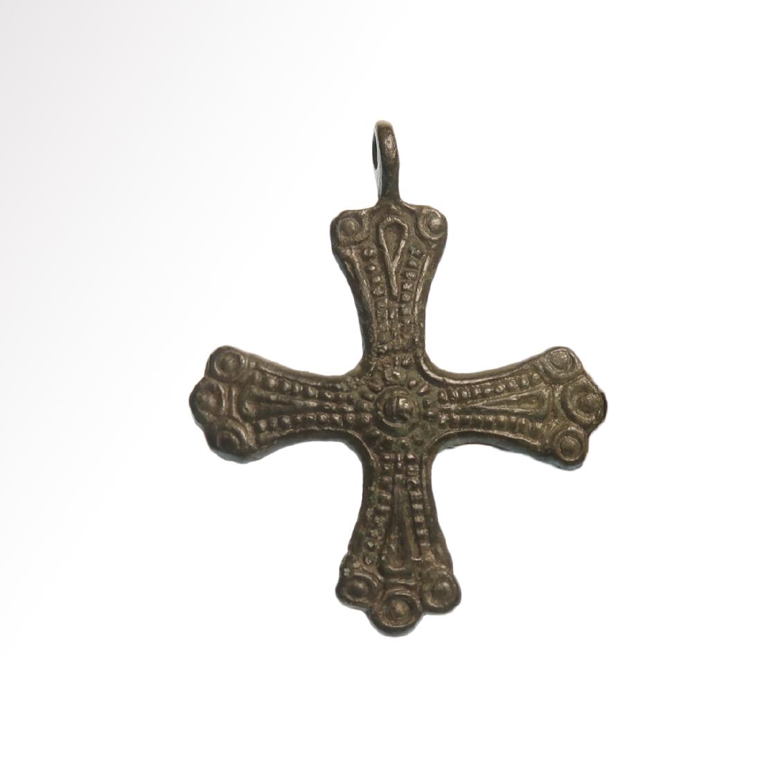 Viking Bronze Cross Pendant, 10th-11th century A.D.: Title: Viking Bronze Cross Pendant, 10th-11th century A.D. Date & Origin: Viking, c. 11th Century A.D. Description: Carved with pattern of dots Material: Bronze Dimension: 4.2 cm L - 1 5/8 inches Prov