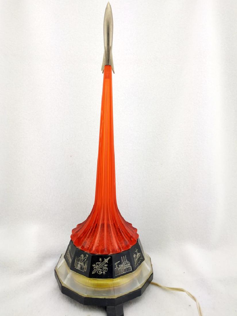 Vintage Night lamp Rocket. Dedicated to the first space: Title: Vintage Night lamp Rocket. Dedicated to the first space flights of the USSR Maker: USSR Origin: USSR Date/Period: 1970s Materials: Plastic and Metal Size: Height - 39 cm I am present an Vintage