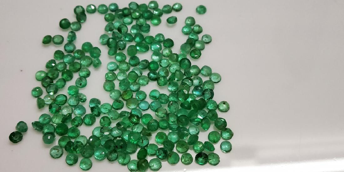 Natural Round Colombian Emerald Wholesale Lot: Reserve Reduced! Title: Natural Round Colombian Emerald Wholesale Lot Gemstones: Emerald Carat Weights: 13.07 Size/Dimensions: 2 x 2 x 1 Number of Pieces: 226 Reserve: $175.00 Jasper52 negotiates the