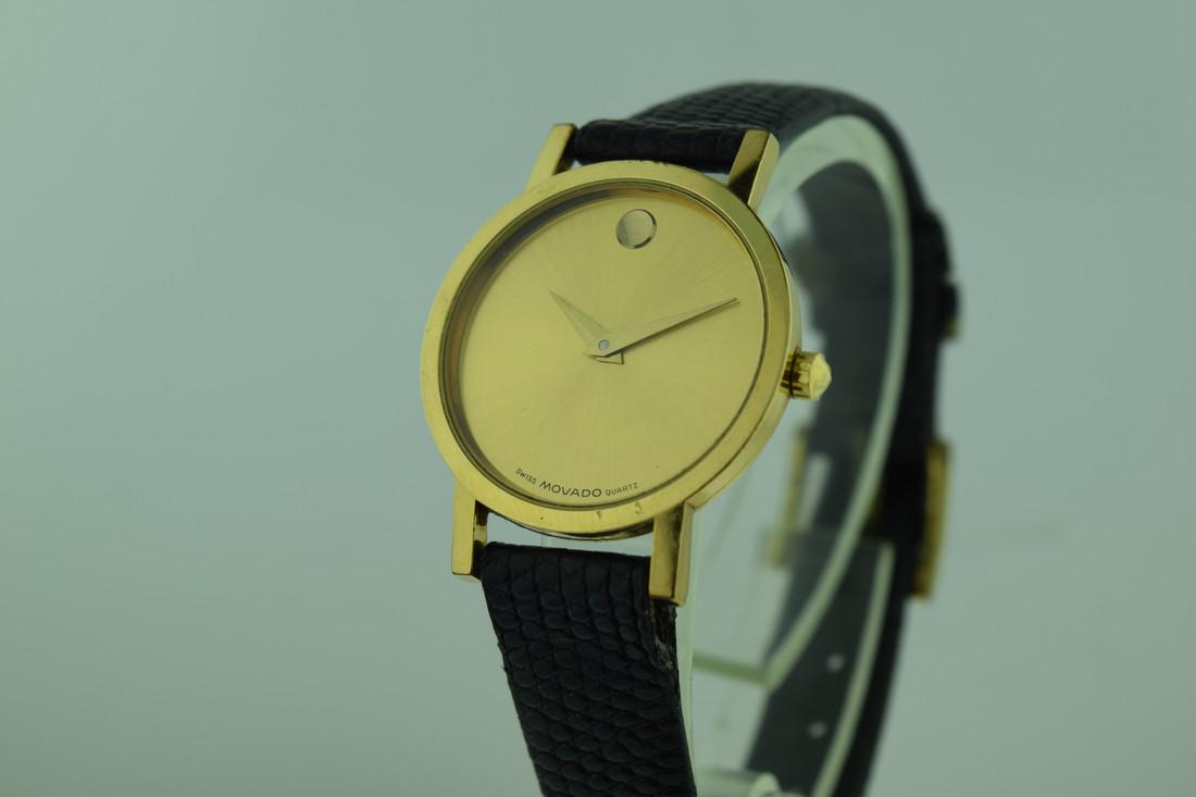 Movado Champagne Dial Museum Watch: Item: Movado Champagne Dial Museum Watch Brand: Movado Date: 2000s Movement: Battery operated Case Metal: Gold plated Case Size: 25mm Bracelet Type: Leather Bracelet Length: 6.5 inches Champagne dial