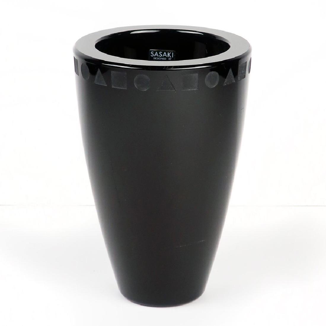 Ward Bennett for Sasaki Post-Modern Black Crystal Vase: A stunning post-modern design by Ward Bennett for Sasaki (c. 1975), this thick-walled black crystal vase from the Sengai line has a flat cut-polished top decorated with a row of repeated carved triang