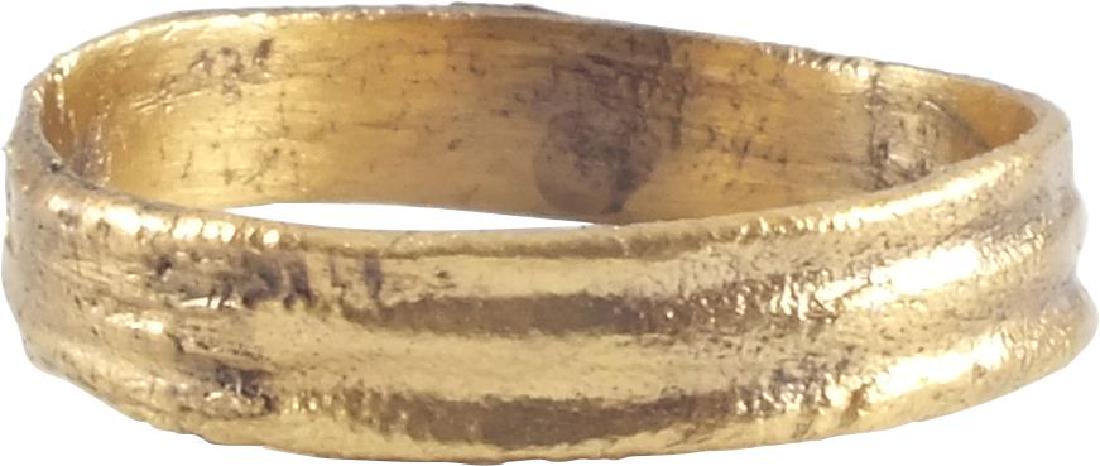 ANCIENT VIKING WEDDING RING C.850-1050 AD: No Reserve! Sz 8 ½. Gilt bronze. Wide band with central round faced ridge. Size 8 ½. Double incised annular grooves producing a triple band section. Vikings exchanged rings on the pommel of the groo