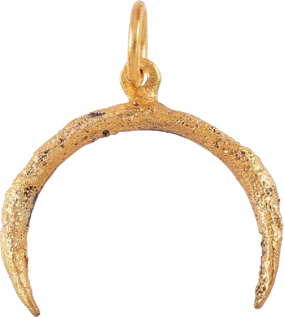 VIKING LUNAR/ASTROLOGICAL PENDANT C.850-950 AD: Gilt bronze, just under 1" width. Elegant slender form tapering to the terminals. Possibly representing an auspicious phase as new moon. As expert navigators, the constellations signified mystery and 
