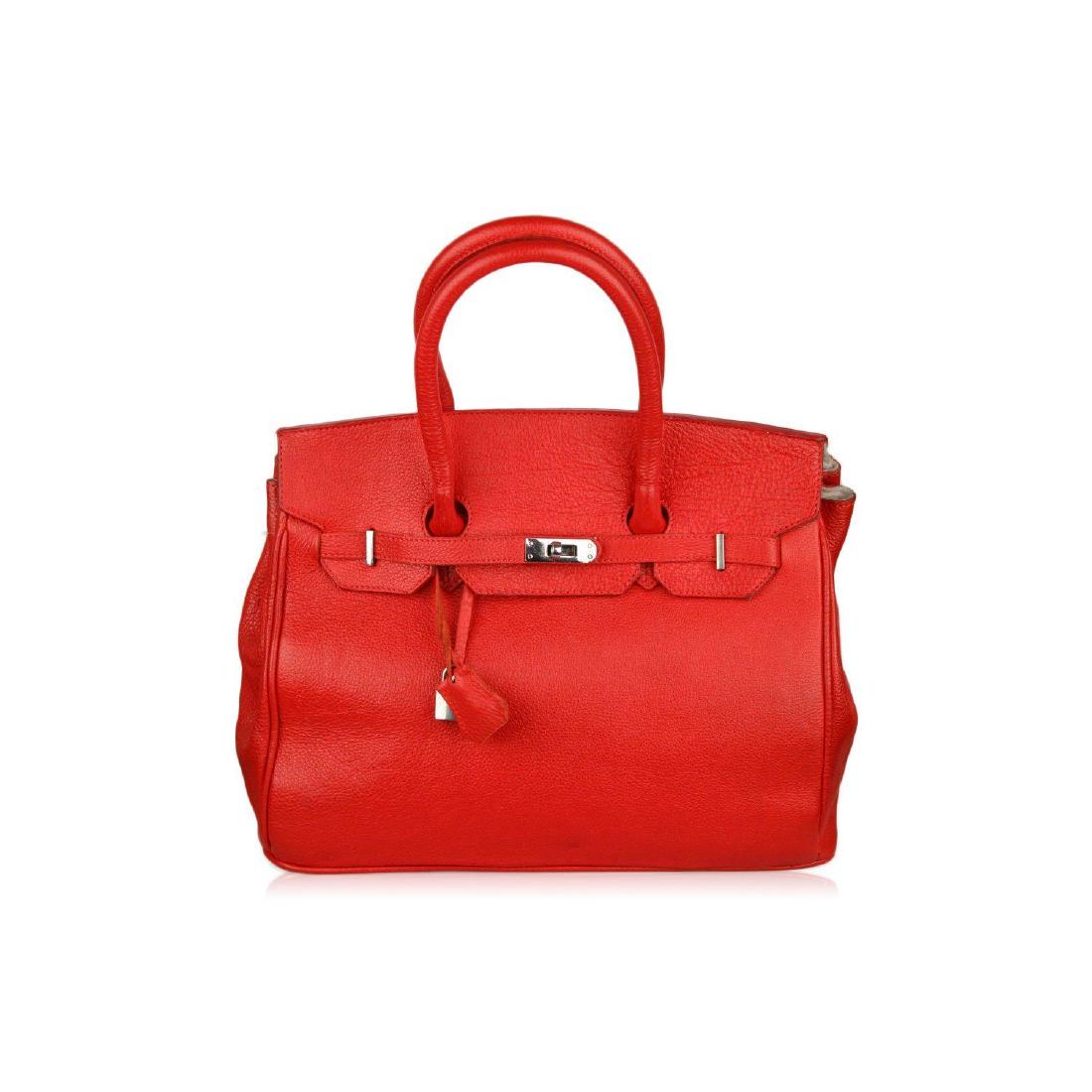 Unbranded MADE IN ITALY Red Leather TOP HANDLES Bag: - 'GENUINE LEATHER - Made in Italy' tag inside - The bag is locked by closing the top flaps over buckle loops, wrapping the buckle straps, or closing the lock on the front hardware - Padlock & keys in