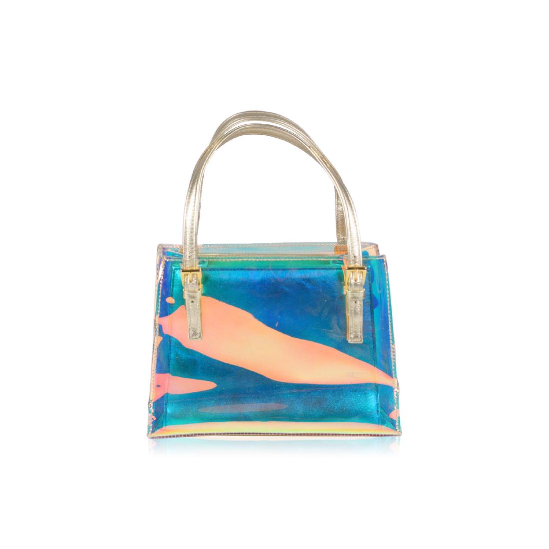 Stuart Weitzman Iridescent Plastic 2 in 1 Handbag: MATERIAL: Plastic, Leather COLOR: Gold MODEL: Top handles bag GENDER: Women SIZE: Small Condition CONDITION DETAILS: B :GOOD CONDITION - Some light wear of use - Some scratches on plastic due to norma