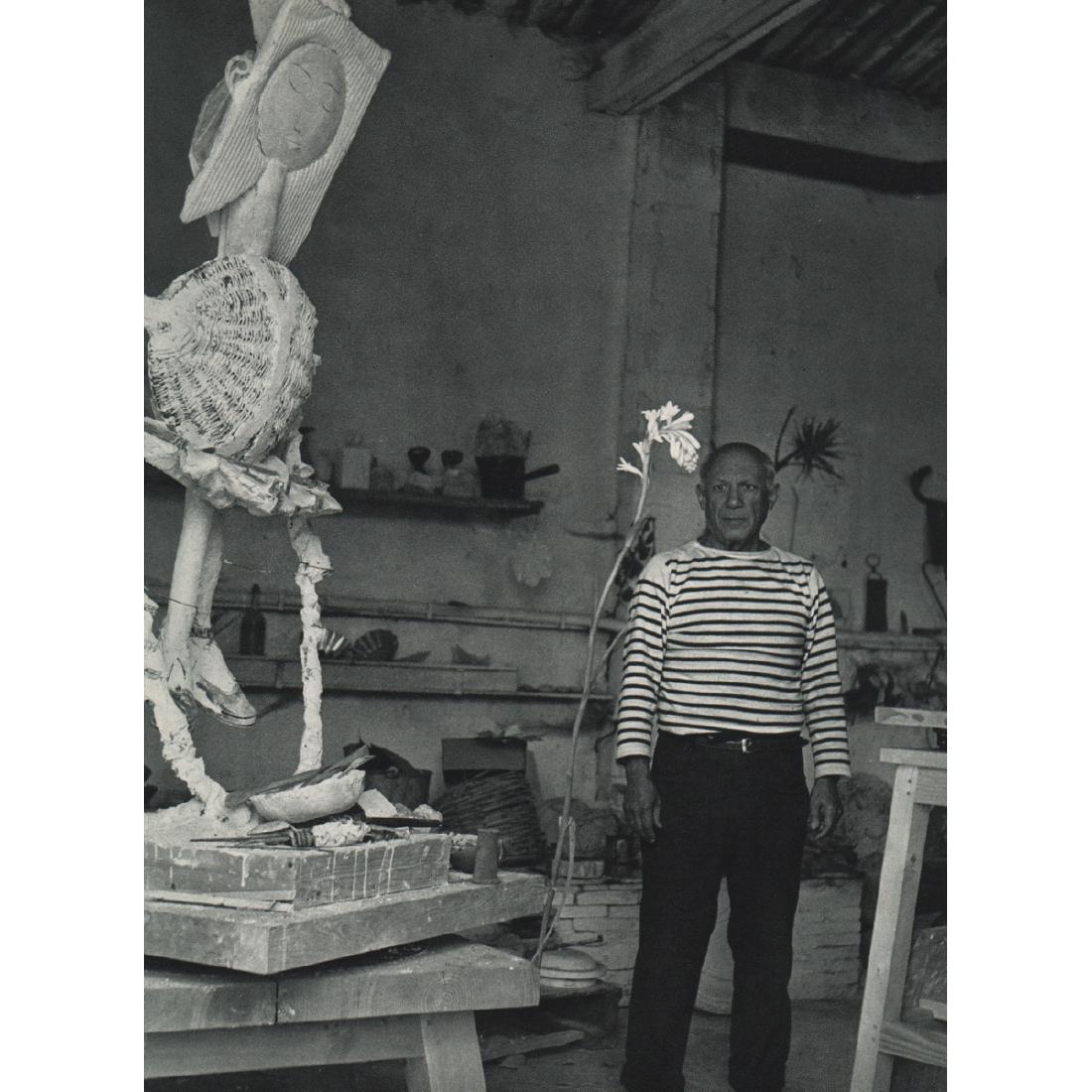 ROBERT DOISNEAU - Picasso in his Studio: Artist: ROBERT DOISNEAU Print Title: Picasso in his Studio Medium: Sheet-fed Gravure Printing Date: 1950's Printed in France Image Size approx: 6.5 x 9 inches Robert Doisneau (1912-1994) was a French