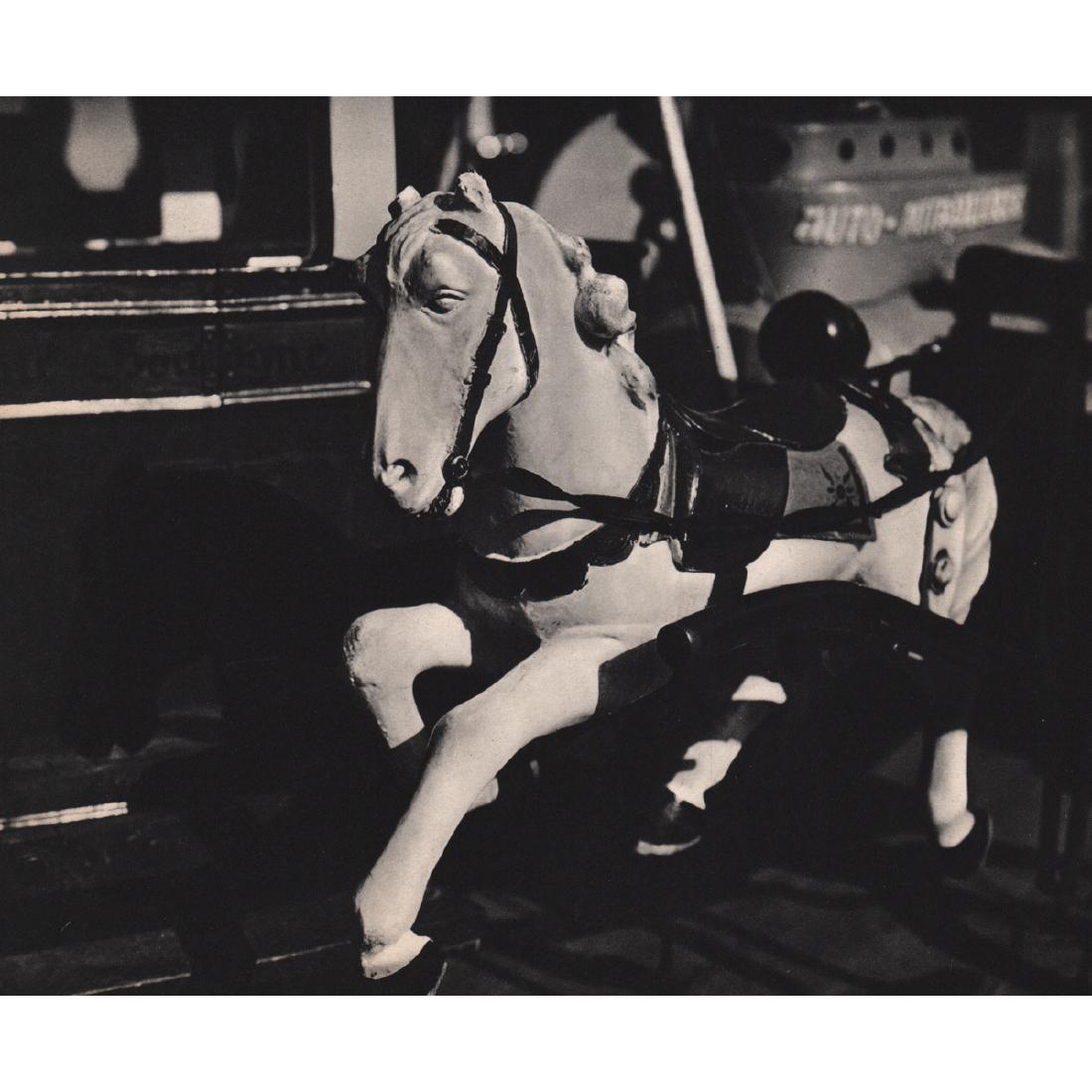 LEE MILLER - Carousel Horse: Artist: LEE MILLER Print Title: Carousel Horse Medium: Sheet-fed Gravure Printing Date: 1930's Printed in France Image Size approx: 9 x 7.5 inches Elizabeth "Lee" Miller, Lady Penrose (1907 – 1977),