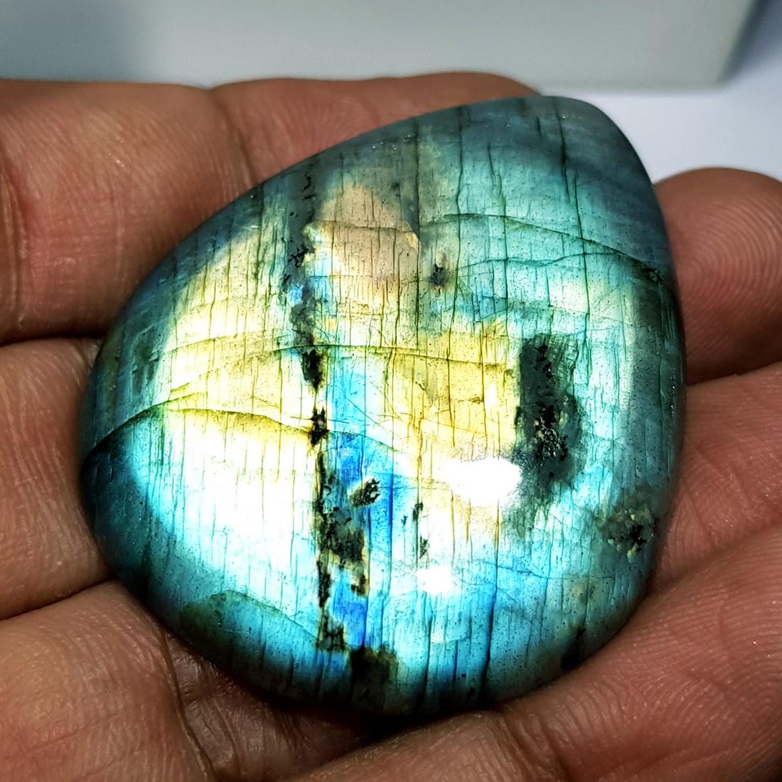 96.80 ct Natural Labradorite: No Reserve! Title: 96.80 ct Natural Labradorite Color/Clarity: Opaque Gemstones: Gemstones Carat Weights: 96.8 Size/Dimensions: 45.26 x 36.10 x 7.72 Additional Information: Pear - USA Shipping:<