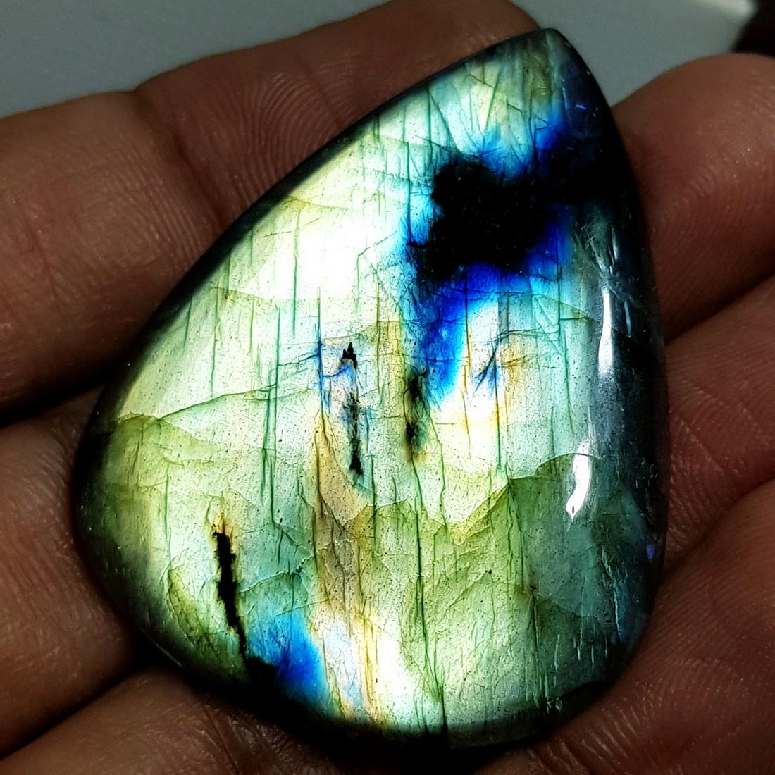 65.97 ct Natural Labradorite: No Reserve! Title: 65.97 ct Natural Labradorite Color/Clarity: Opaque Gemstones: Gemstones Carat Weights: 65.97 Size/Dimensions: 43.86 x 33.74 x 5.62 Additional Information: Pear - USA Shipping: