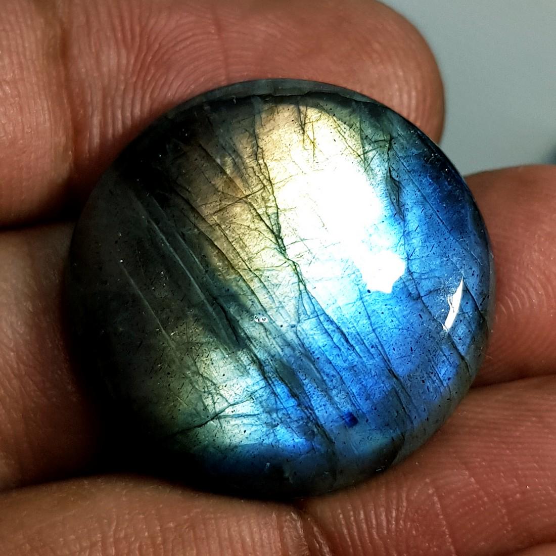 29.42 ct Natural Labradorite: No Reserve! Title: 29.42 ct Natural Labradorite Color/Clarity: Opaque Gemstones: Gemstones Carat Weights: 29.42 Size/Dimensions: 24.23 x 24.23 x 6.08 Additional Information: Round - USA Shipping: