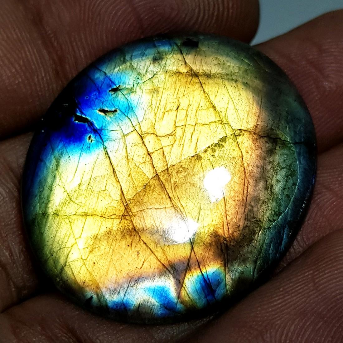 38.77 ct Natural Labradorite: No Reserve! Title: 38.77 ct Natural Labradorite Color/Clarity: Opaque Gemstones: Gemstones Carat Weights: 38.77 Size/Dimensions: 32.43 x 27.67 x 5.34 Additional Information: Oval - USA Shipping: