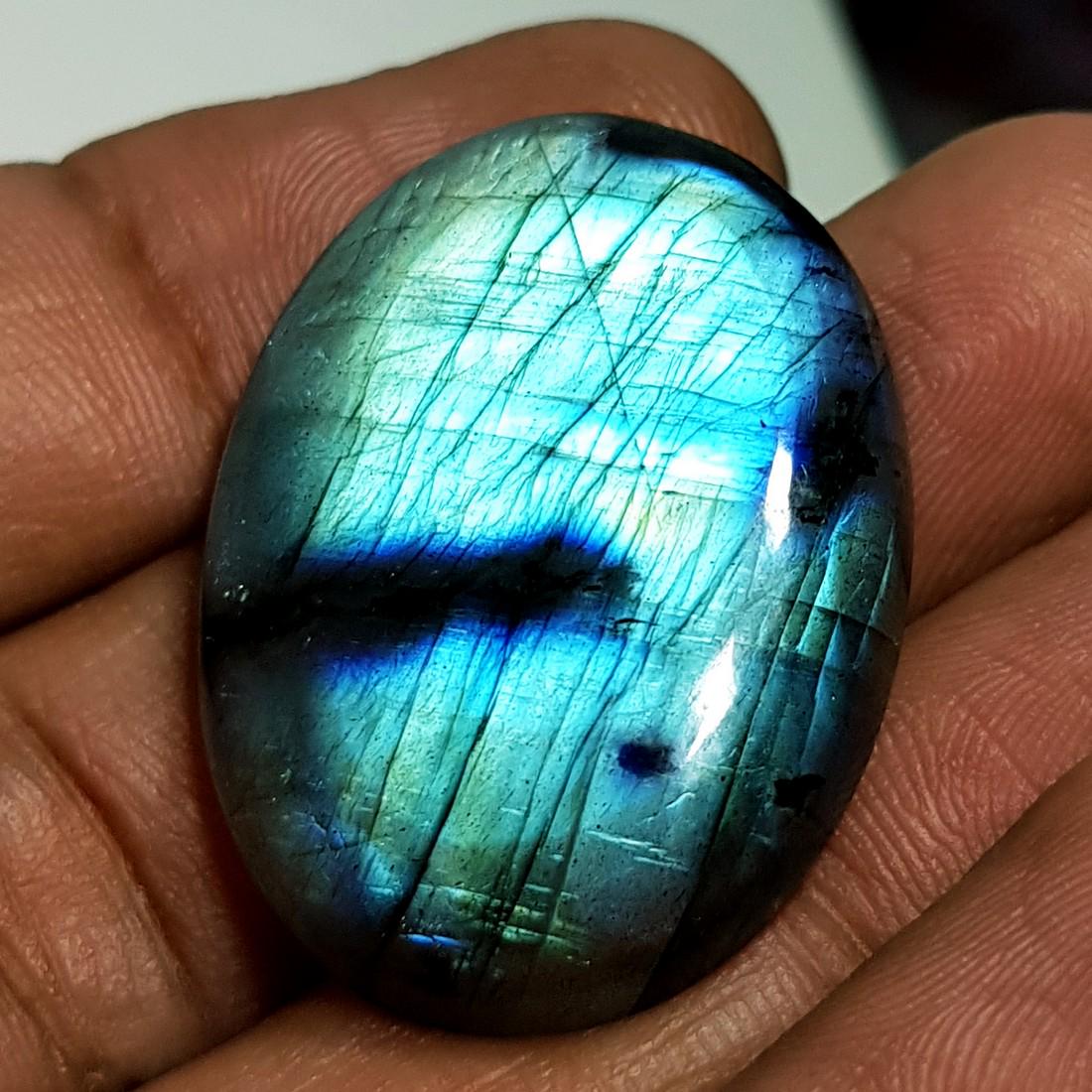 47.45 ct Natural Labradorite: No Reserve! Title: 47.45 ct Natural Labradorite Color/Clarity: Opaque Gemstones: Gemstones Carat Weights: 47.45 Size/Dimensions: 32.47 x 24.28 x 7.05 Additional Information: Oval - USA Shipping: