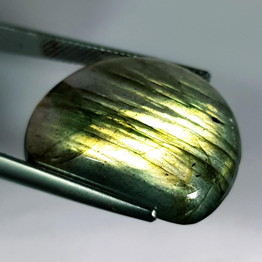 27.53 ct Natural Labradorite: No Reserve! Title: 27.53 ct Natural Labradorite Color/Clarity: Opaque Gemstones: Gemstones Carat Weights: 27.53 Size/Dimensions: 24.06 x 19.28 x 6.72 Additional Information: Fancy - USA Shipping: