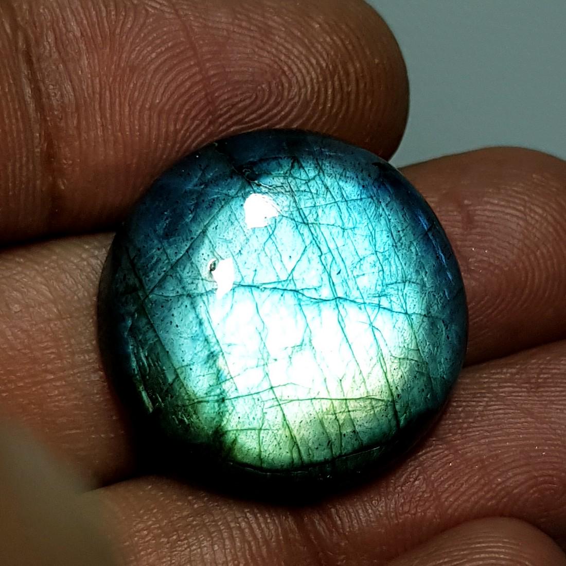26.85 ct Natural Labradorite: No Reserve! Title: 26.85 ct Natural Labradorite Color/Clarity: Opaque Gemstones: Gemstones Carat Weights: 26.85 Size/Dimensions: 22.00 x 22.00 x 6.76 Additional Information: Round - USA Shipping: