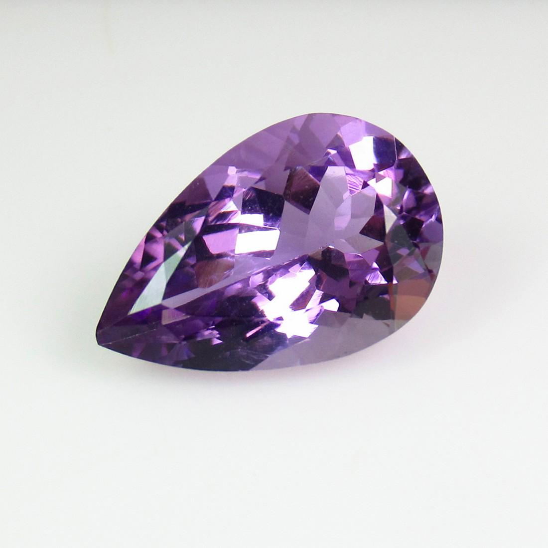 5.40 Ct Genuine Brazil Purple Amethyst 15X10 mm Pear: No Reserve! Title: 5.40 Ct Genuine Brazil Purple Amethyst 15X10 mm Pear Cut Stone Clarity: VVS Gemstones: Natural Amethyst Pear Carat Weights: 5.40 Size/Dimensions: 15.10 x 10.00 x 7.30 mm Additional 
