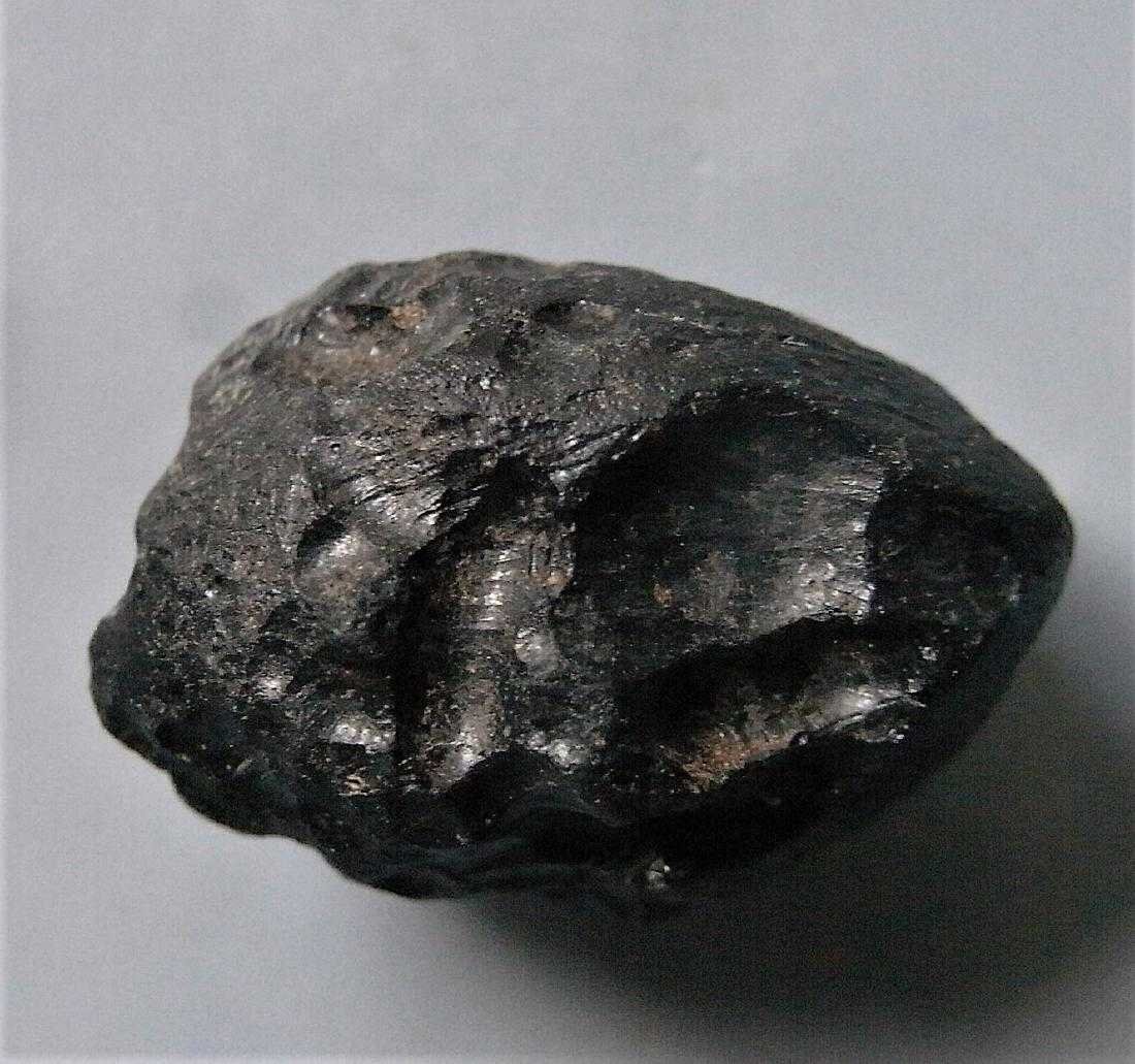THAILANDITE TEKTITE - FROM METEORITE IMPACT: Title: THAILANDITE TEKTITE - FROM METEORITE IMPACT Origin: Noen Sa-Nga, Chaiyaphum Province, Thailand Size: 2x1.5x1.5 cm / 5 gram Additional Information: perfect oval shaped thailandite tektite with s