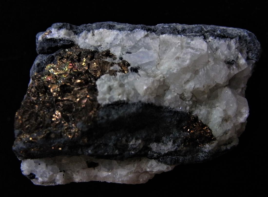 CHALCOPYRITE & CALCITE: Title: CHALCOPYRITE & CALCITE Origin: Cherveno Zname Mine, Sozopol, Burgas, Bulgaria Size: 4x3x3 cm / 66 gram Additional Information: dark brassy chalcopyrite with white cystalline calcite in layered