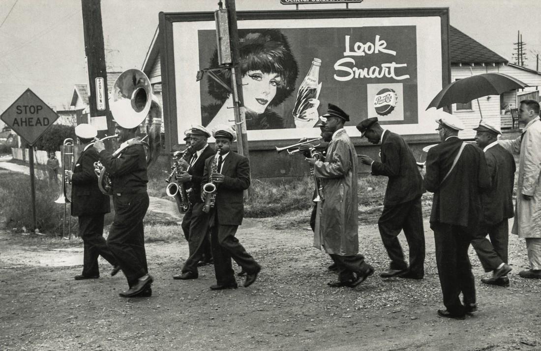 LEE FRIEDLANDER - Young Tuxedo Brass Band: Artist: Friedlander, Lee Title: Young Tuxedo Brass Band Medium: Photo Litho, 1992, Italy Dimensions: 8.7x5.65" Heat Wax Mounted on 11x14" Conservation Board Lee Friedlander (1934) is an American phot