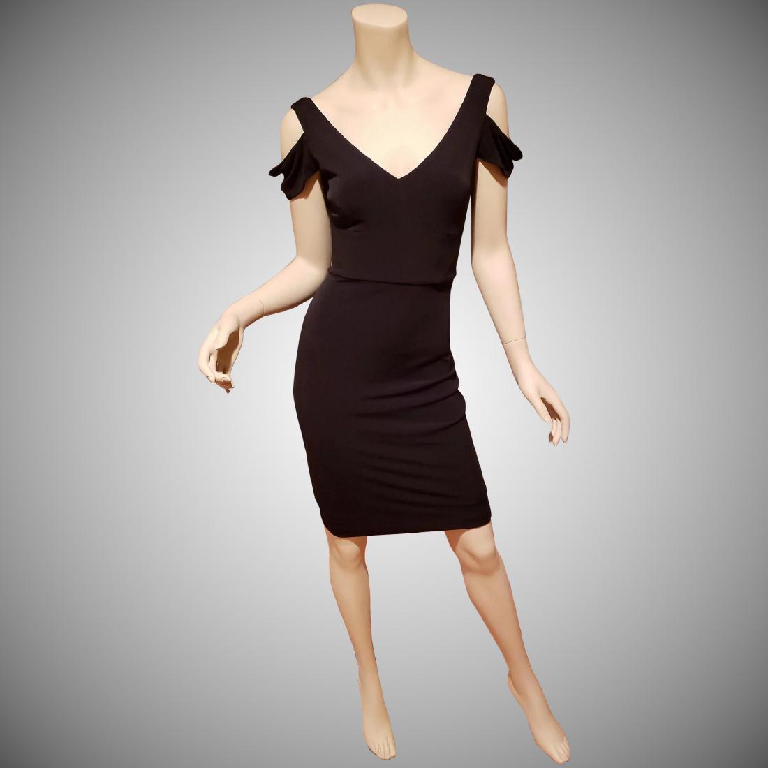 Vtg Calvin Klein Cold Shoulder Sheath black dress -S: Beautiful cold shoulder Calvin Klein jersey dress with details. Cocktail sheath dress In very good vintage condition Size 4-S Shipping: Domestic: Flat-rate of $28.00 to anywhere within the contiguous