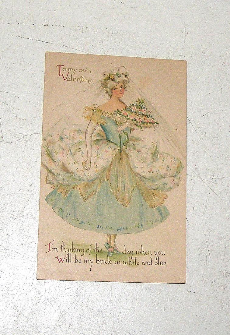 Nister Postcard w/ Bride in Fashion Gown of Blue&White: No Reserve! Title: NISTER WHITE AND BLUE BRIDE VALENTINE Ernest Nister Dutton Subject: Shows a young bride in white and blue dress, Description: Address written on back but Valentine never used Postal