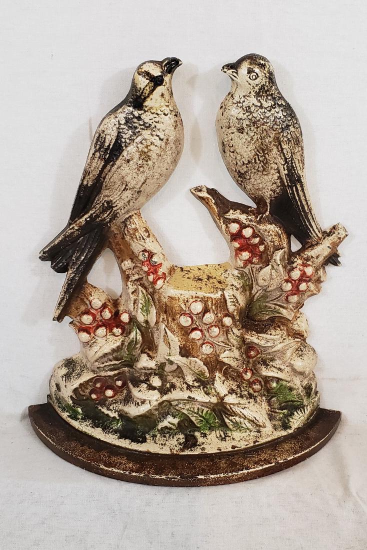 Hubley swallows door stop ca 1920's: Title: Hubley swallows door stop ca 1920's Dimensions: 8 1/2" tall x 7 1/2" wide A nice example with some color loss, but in otherwise excellent condition. No rust or breaks. Shipping: Domestic: Flat-