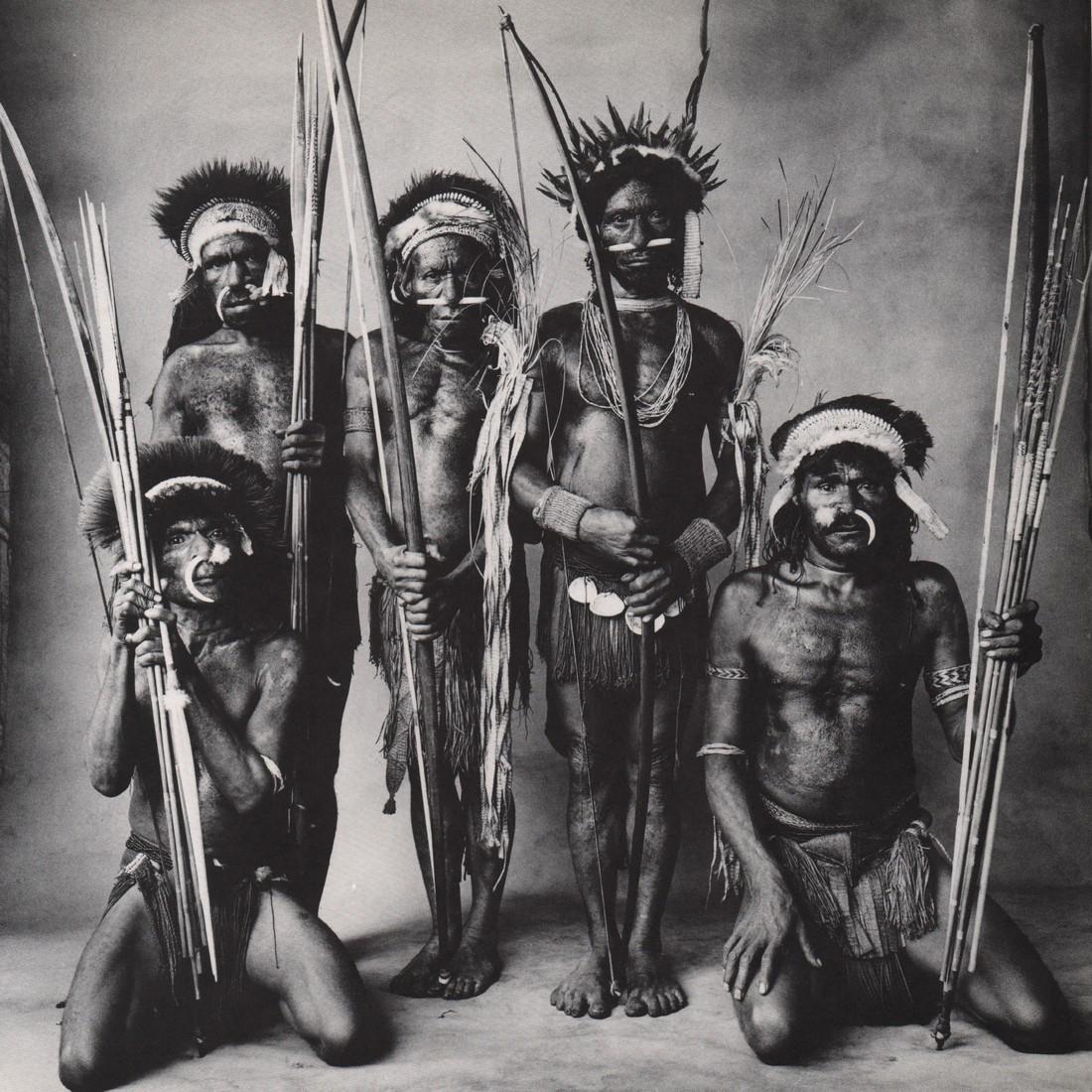 IRVING PENN - Okapa Warriors: Artist: IRVING PENN Print Title: Okapa Warriors Medium: Photoengraving Printed 1974 in the US Image size (inches) approx. 10 x 10” Irving Penn was an American photographer known for his fashion phot
