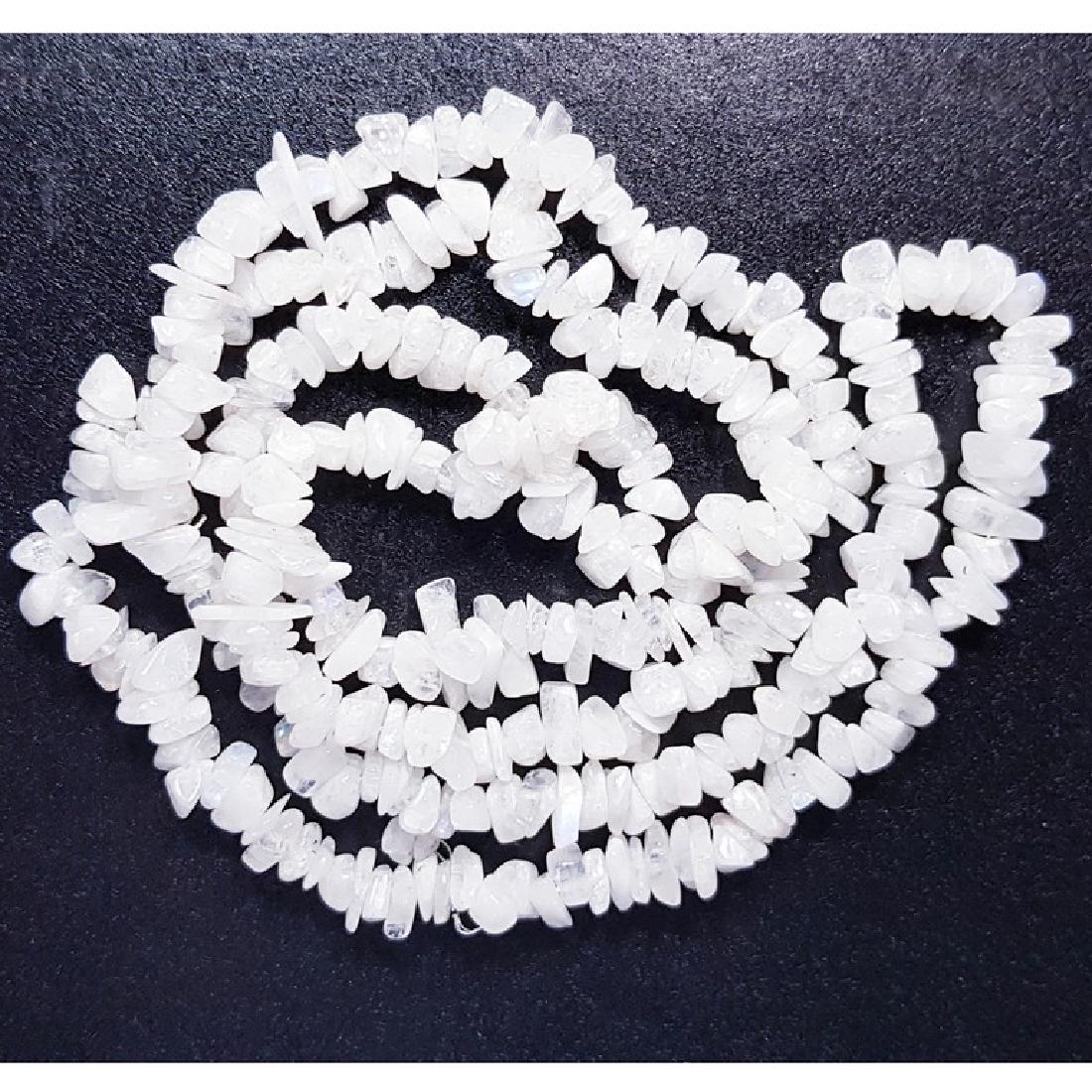 349.15 ct 17inch Natural Rainbow Moonstone Beads: No Reserve! Title: 349.15 ct 17inch Natural Rainbow Moonstone Beads Color/Clarity: Opaque Carat Weights: 349.15 Size/Dimensions: 17inches X 18 inches Additional Information: Fancy - Shipping: Worldw