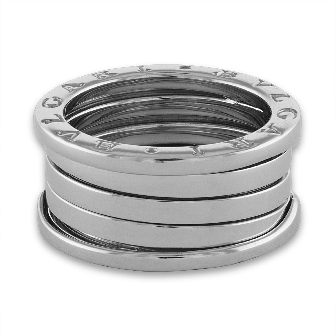 Bvlgari 18K White Gold B.Zero 3 Band Ring: Item: Bvlgari 18K White Gold B.Zero 3 Band Ring Brand: Bvlgari Metal Purity: 18K White Gold Size/Dimensions: 7.25 9.5 grams Reserve: $800.00 Shipping: Domestic: Free shipping to anywhere within the co