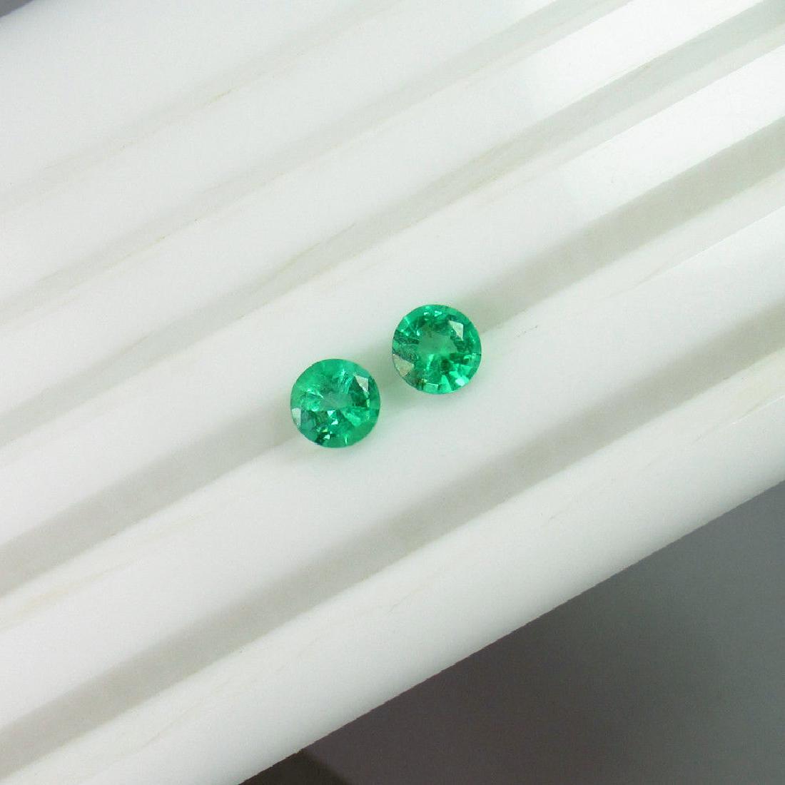 1.22 Ctw Natural Zambian Emerald 5.5 mm Round Pair (1 of 3)