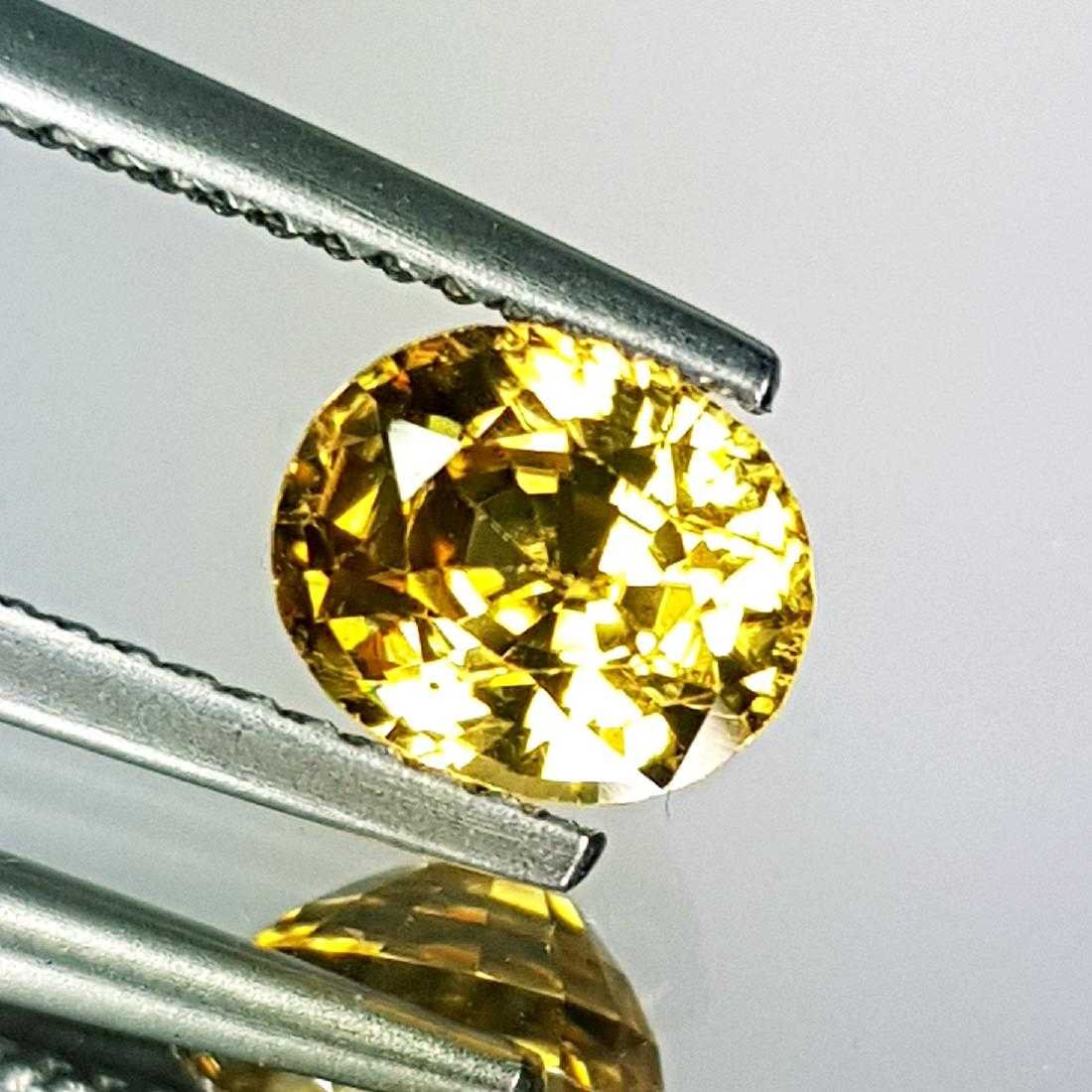 2.14 ct Top Quality Gem Natural Golden Zircon: No Reserve! Title: 2.14 ct Top Quality Gem Natural Golden Zircon Color/Clarity: VVS Gemstones: Loosegemstone Carat Weights: $2 Size/Dimensions: 7.28 x 6.10 x 4.76 Additional Information: Oval - Cambod