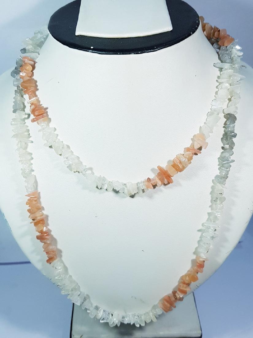 198.10 ct 18inch Natural Fancy Moonstone Beads: No Reserve! Title: 198.10 ct 18inch Natural Fancy Moonstone Beads Color/Clarity: Opaque Gemstones: Gemstones Carat Weights: 198.1 Size/Dimensions: 18inches X 19 inches Additional Information: Fancy - 