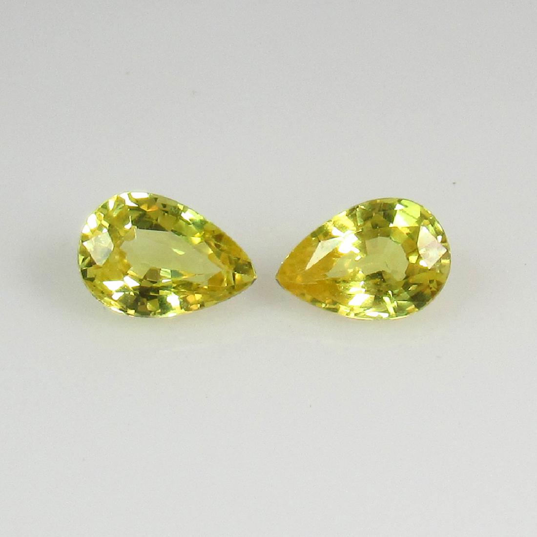 0.95 Ct Genuine Ceylon Yellow Sapphire Pear Pair: No Reserve! Title: 0.95 Ct Genuine Ceylon Yellow Sapphire Pear Pair Stone Clarity: VVS Gemstones: Natural Yellow Sapphire Carat Weights: 0.95 Size/Dimensions: 5.80 x 4.00 x 2.60 mm / 2 PC's Additional