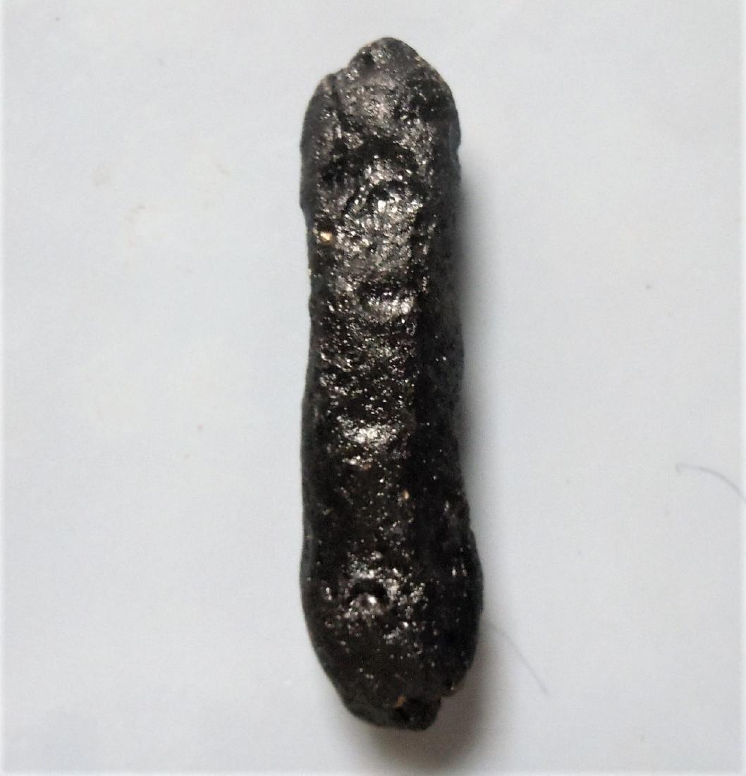 RIZALITE TEKTITE - FROM METEORITE IMPACT: Title: RIZALITE TEKTITE - FROM METEORITE IMPACT Origin: Paracale, Camarines Norte, Bicol Region, Luzon, Philippines Size: 4.6x1.1x1.1 cm / 9 gram Description: thin "stick" of rizalite tektite. Grooves