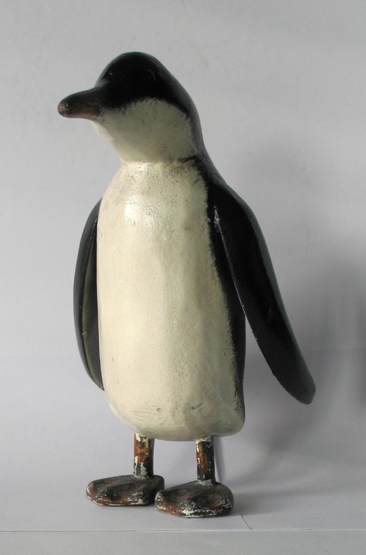 Folk art penguin carving. (1 of 4)