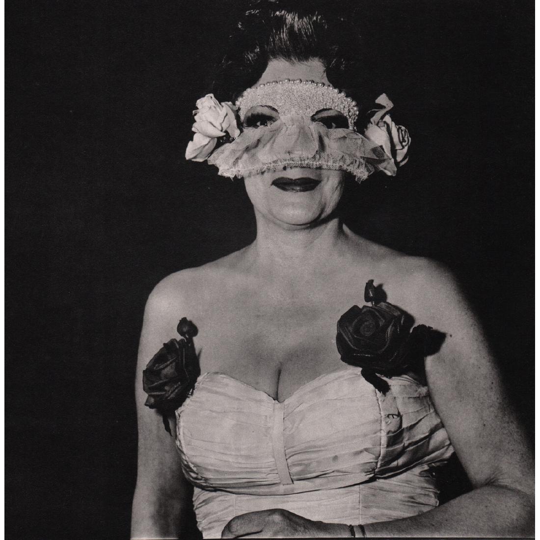 DIANE ARBUS - Lady at a Masked Ball, New York 1967: Artist: DIANE ARBUS Print Title: Lady at a Masked Ball, New York 1967 Limited Edition folio 288/1000 Medium: Sheet-Fed Gravure Printed in 1970's Printed in Italy Image Size: 9.75 x 9.5 inches Diane Ar