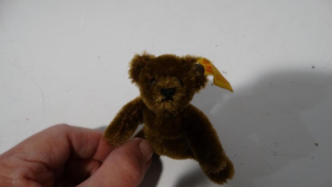 STEIFF MINIATURE DARK BROWN TEDDY YELLOW TAG WITH: STEIFF MINIATURE DARK BROWN TEDDY YELLOW TAG WITH BUTTON 0206/11 in box STEIFF MINIATURE DARK BROWN TEDDY YELLOW TAG WITH BUTTON 0206/11 in box Click images to enlarge Description STEIFF DARK BROWN YE