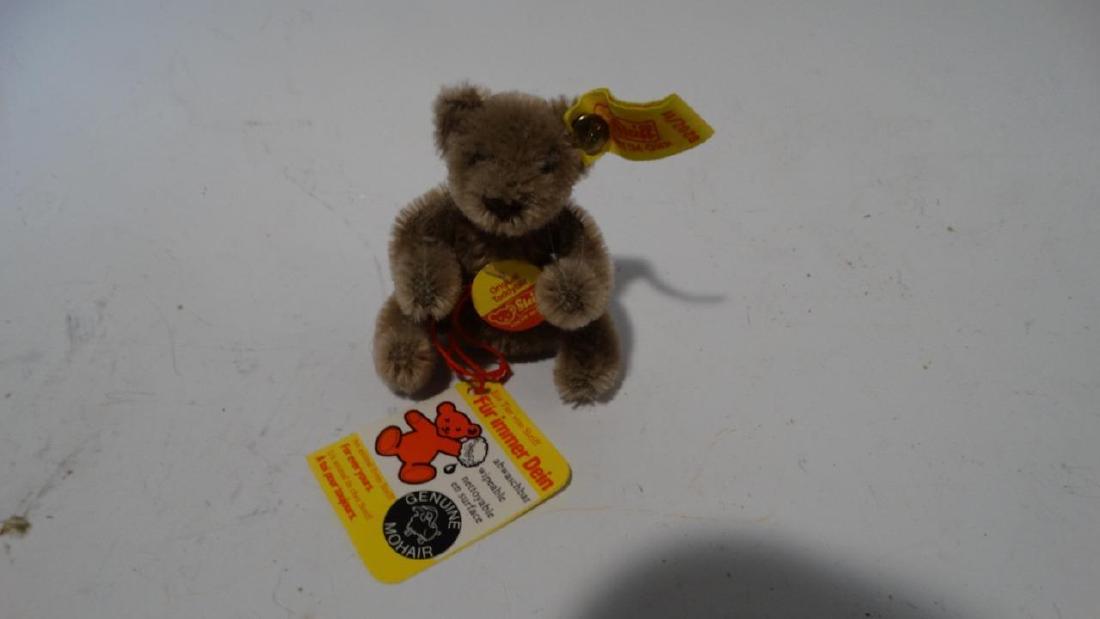 STEIFF MINIATURE TEDDY FULLY TAGGED WITH BUTTON GRAY: STEIFF MINIATURE TEDDY FULLY TAGGED WITH BUTTON GRAY 0202/11 MADE IN AUSTRIA STEIFF MINIATURE TEDDY FULLY TAGGED WITH BUTTON GRAY 0202/11 MADE IN AUSTRIA Click images to enlarge Description STEIFF CHO