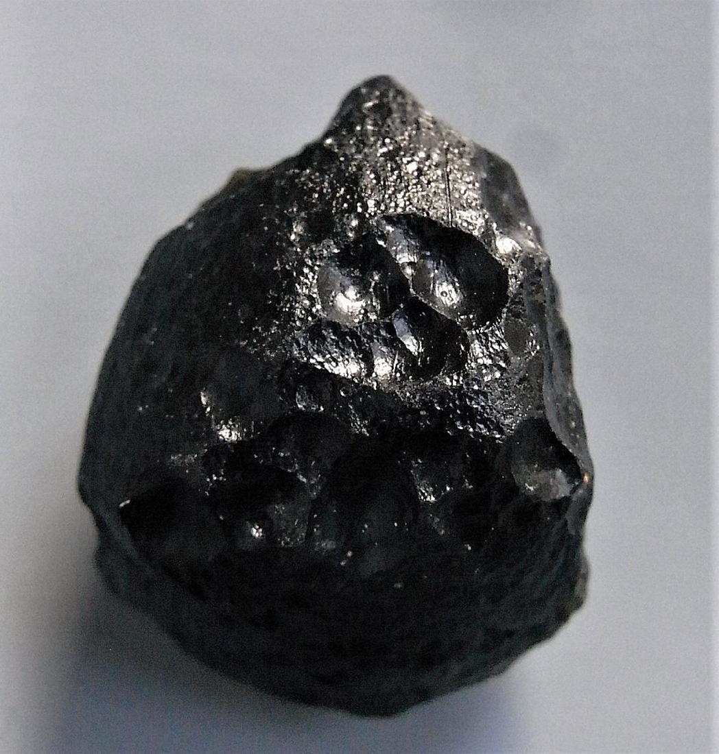 THAILANDITE TEKTITE - FROM METEORITE IMPACT: Title: THAILANDITE TEKTITE - FROM METEORITE IMPACT Origin: Noen Sa-Nga, Chaiyaphum Province, Thailand Size: 2x1.5x1 cm / 5 gram Description: irregular thailandite tektite. Mixture of bisquit and drop 