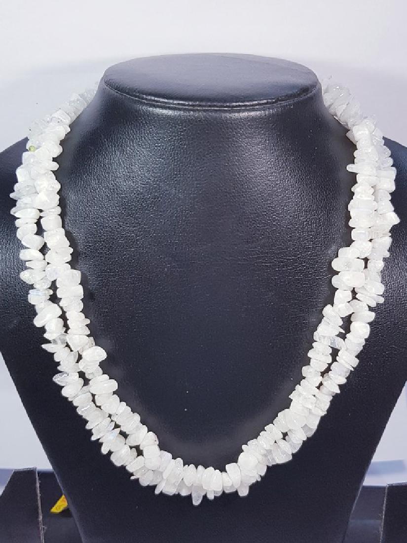 337.85 ct 17inch Natural Rainbow Moonstone Beads: No Reserve! Title: 337.85 ct 17inch Natural Rainbow Moonstone Beads Color/Clarity: Opaque Gemstones: Gemstones Carat Weights: 337.85 Size/Dimensions: 5.5mm to 6.5mm Additional Information: Fancy - S