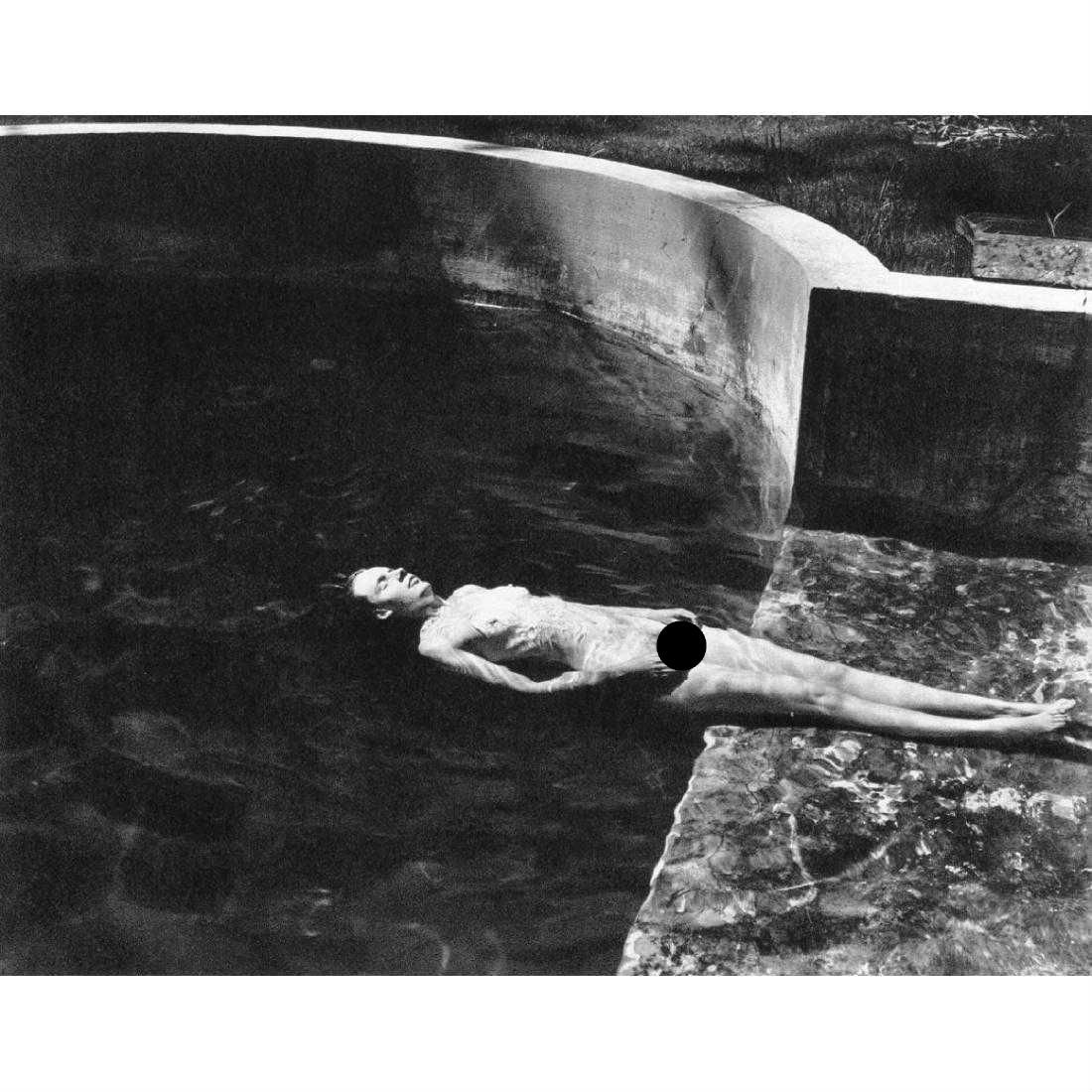EDWARD WESTON - Nude Floating, 1939: Artist: EDWARD WESTON Print Title: Nude Floating, 1939 Medium: Sheet-Fed Gravure Printing Date: 1970's Printed in Switzerland Image Size: 7.5 X 6 inches Edward Weston (1886-1958) was a 20th-century Am