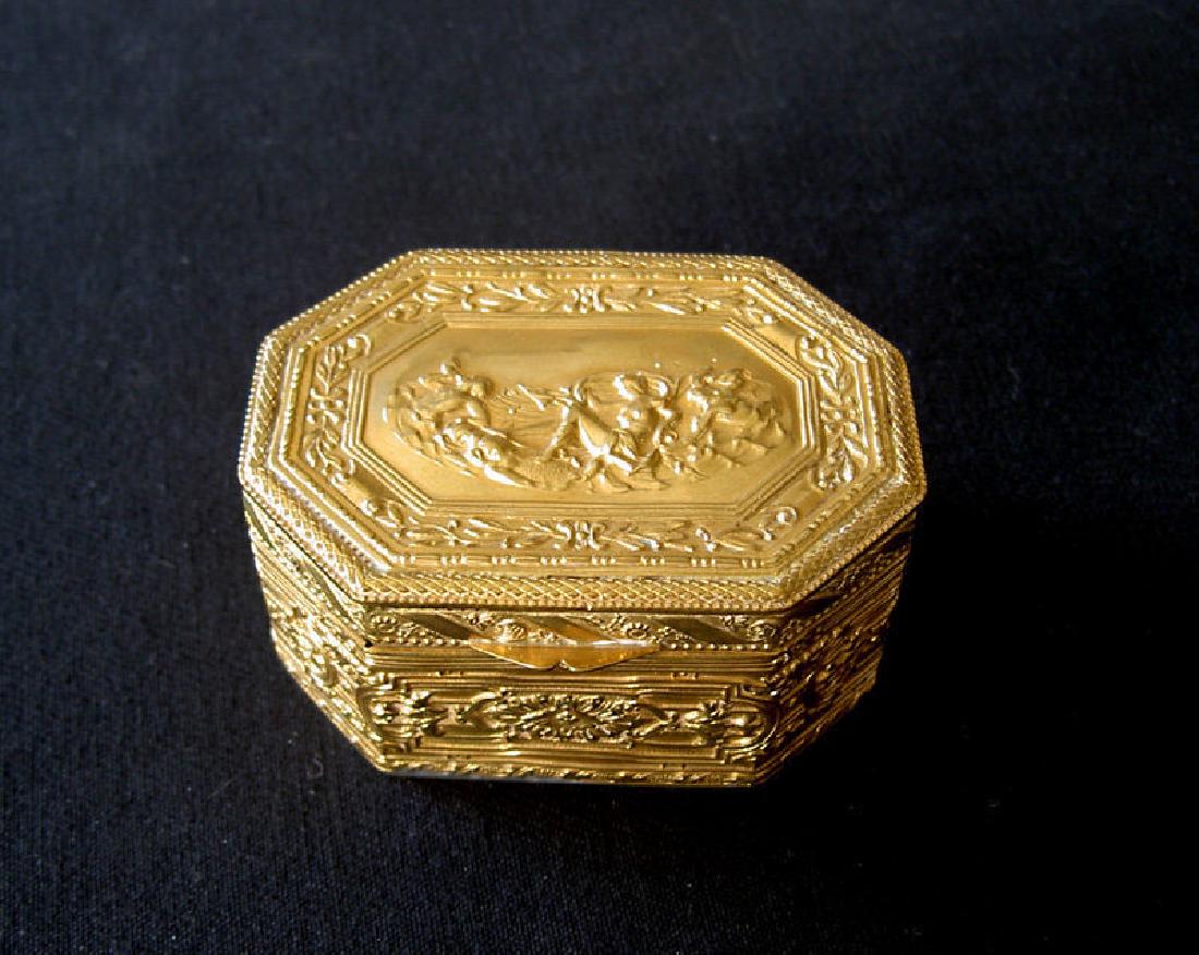 French empire style ormolu box: Reserve Reduced! French antique ormolu box, c 1840. The lid with Venus on a dolphin, celebrated by a triton and a naiad, the sides with classic borders typical of the period. Width "3¼/ 8 cm, height