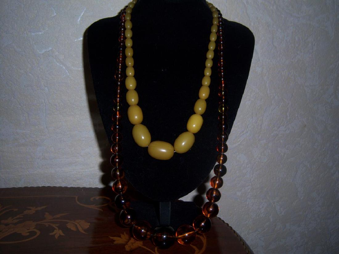 Vintage Two Bakelite Beads Necklace: Title: Vintage Two Bakelite Beads Necklace Carat Weights: 115,2 Gr ; Size/Dimensions: L 72 cm ; 52 cm Reserve: $85.00 Shipping: Domestic: Flat-rate of $20.00 to anywhere within the contiguous U.S.