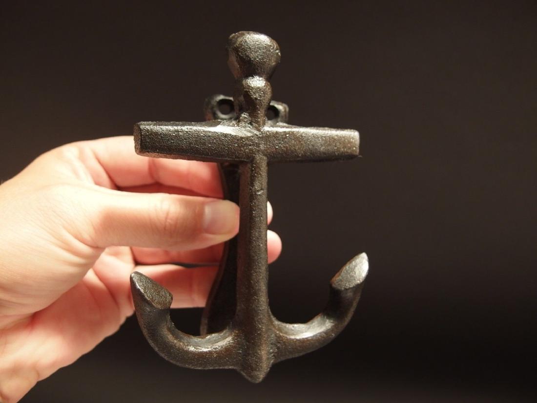 Cast Iron Anchor Door Knocker: 3 1/2" Wide x 5 1/2" Tall x 1 1/2" extension Great reproduction high quality cast iron door knocker. All cast iron with a black/dark brown finish. Be sure to see the images for the best representation