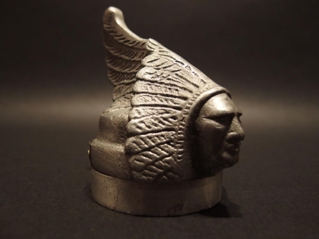 Aluminum Indian Motorcycle Bottle Cap Opener: Description 3 3/4" Tall x 2 1/2" Wide Well made reproduction Indian Motorcycle aluminum bottle cap opener. Nice detailed piece!.. The opener is on the bottom of the piece. Good heavy solid bottle cap