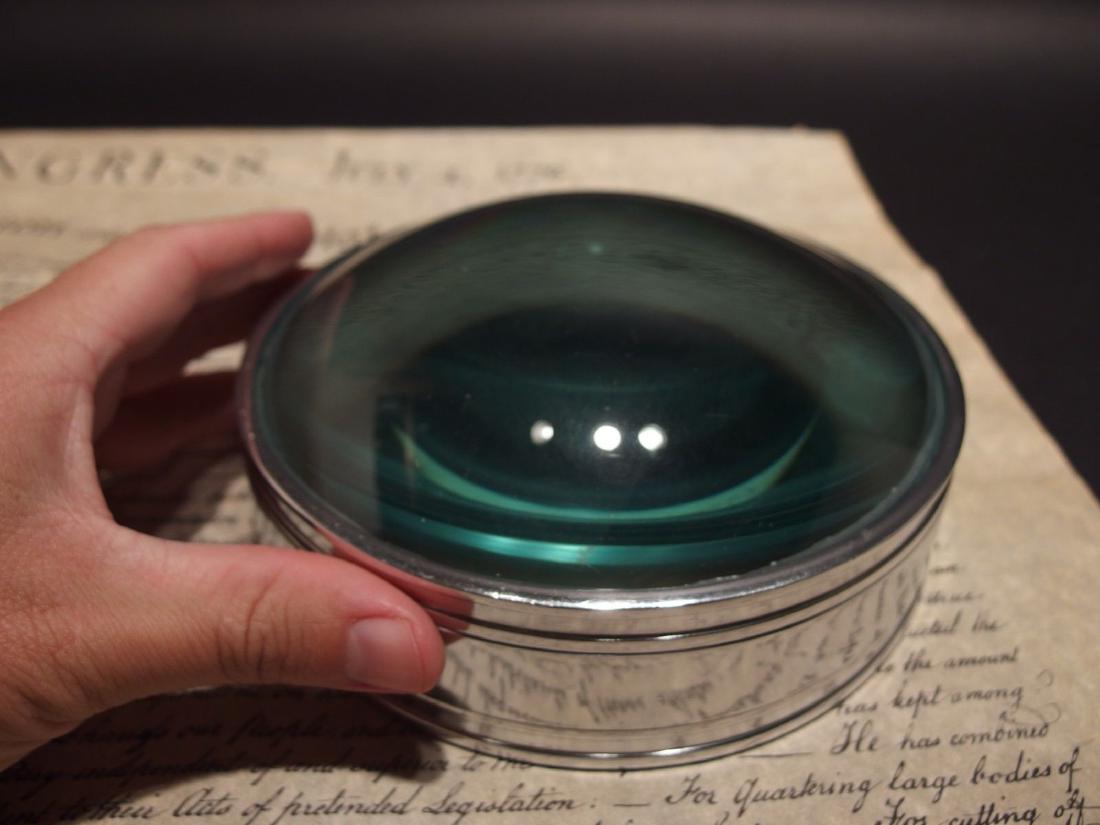 6" Heavy Magnifying Glass Desk Lens Magnifier: 6 3/8" Wide x 2 3/4" Tall Nice reproduction of a large antique magnifying lens. Nice heavy quality thick glass. This piece slides along the surface and magnifies quite well. Magnifying glasses like th