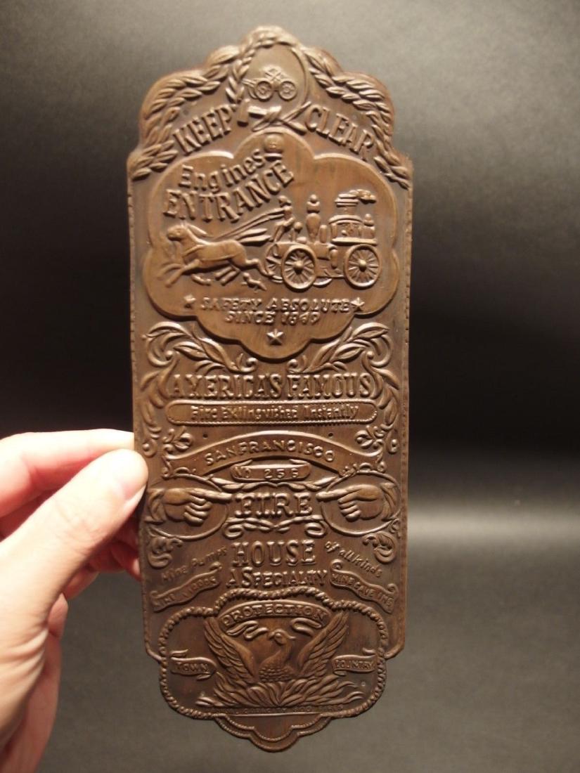 Brass Fireman Firehouse Plaque: 10" Long x 3 3/4" wide Such a neat reproduction fire house plaque. This piece is all brass with a wonderful dark patina, much like what the antique would have. Certainly hard to guess its age! Great f