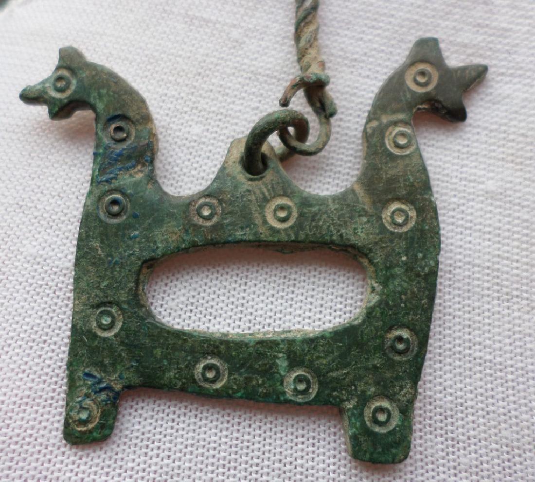Medieval Viking bronze dragon pendant with circle dot (1 of 3)