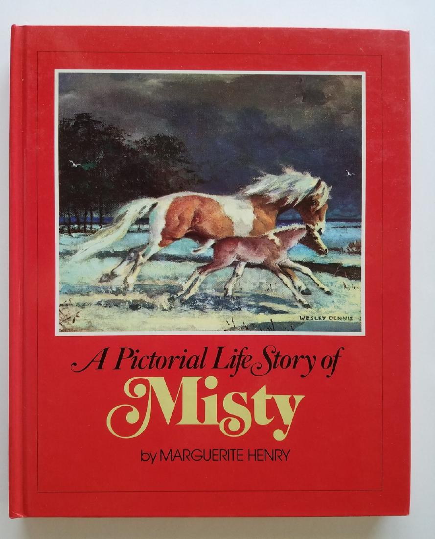 A Pictorial Life Story of Misty. Marguerite Henry.: Title: A Pictorial Life Story of Misty. Marguerite Henry. Author: Long inscription by Marguerite Henry. Published Date: Chicago: 1985. Edition: Third Printing. Condition: Fine in pictorial glossy boar