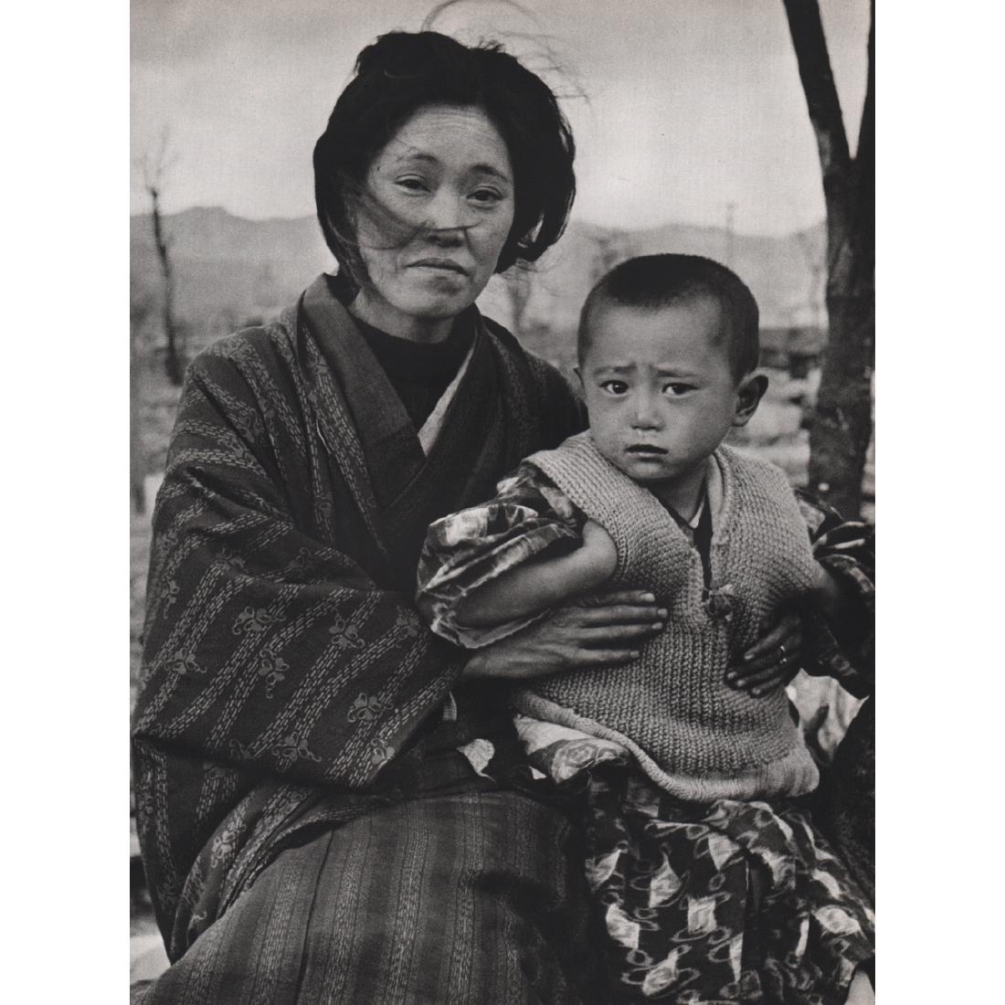 ALFRED EISENSTAEDT - Mother & Child at Hiroshima: Artist: ALFRED EISENSTAEDT Print Title: Mother & Child at Hiroshima Medium: Sheet-fed Gravure Printing Date: 1960's Printed in Switzerland Image Size approx: 9 x 12 inches Alfred Eisenstaedt (1898-199